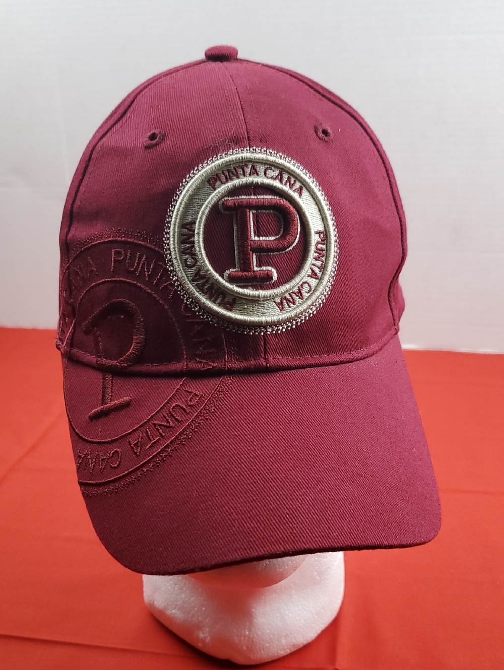 Robin Ruth Burgundy Baseball Cap with Silver Emblem